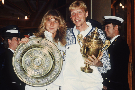 German domination: Legends Steffi Graf and Boris Becker show of their Wimbledon trophies in 1989. Photo: DPA